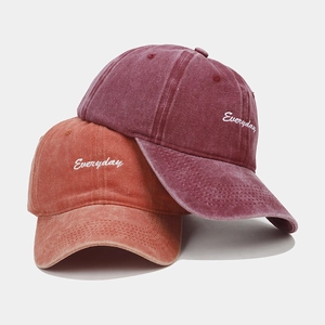 Vintage washed cotton baseball caps in burgundy and brick red with Everyday embroidery