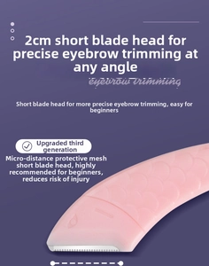 Close-up of pink eyebrow trimmer featuring a 2cm short blade with micro safety guard