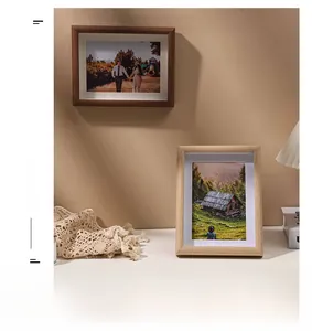 Detail of Nordic wooden photo frame with thick white mat and natural grain texture