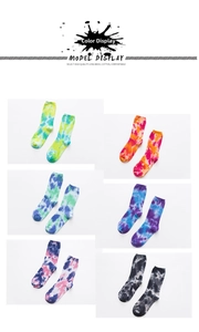 Detail showing various colors of tie-dye crew socks made from premium combed cotton fabric