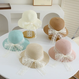 Kids straw hats with lace bow ribbons in various colors for summer beach sun protection