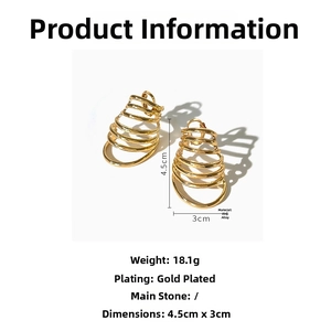 Detailed view of gold multi-layered spiral earrings with size 4.5cm x 3cm and weight specs