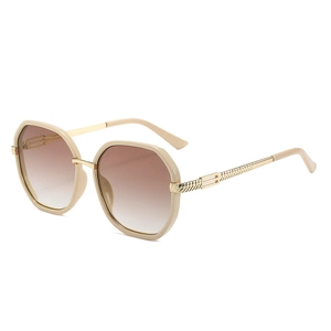 Occhiali da sole ottagonali beige con aste in metallo dorato e lenti sfumate marroni