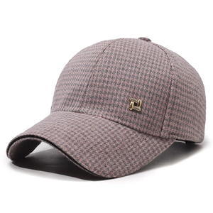 Fashionable pink and grey houndstooth wool baseball cap with a gold metal buckle detail