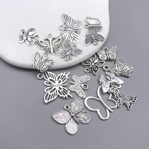 Detailed view of Tibetan silver butterfly alloy pendants for DIY necklace jewelry making