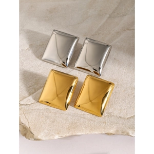 Minimalist 18k gold and silver geometric rectangular stud earrings on stone background