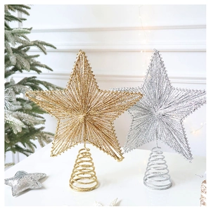 Detail of glittering gold and silver iron star tree toppers with spiral bases