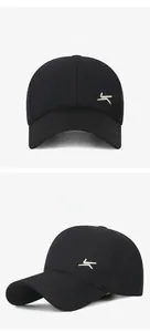 Detail of black twill cotton baseball cap with KOMONT logo embroidery from different angles
