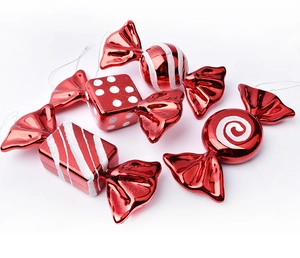 Detail of red and white plated candy Christmas ornaments with glitter patterns