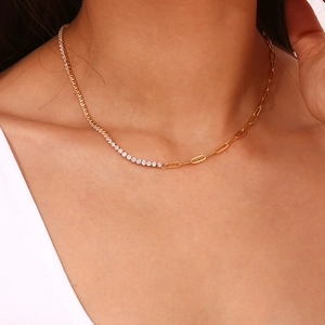 Close-up of 18K gold plated necklace blending cubic zirconia tennis chain and paperclip links