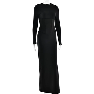 Full-length view of a slim-fit black long-sleeve maxi dress with cinched waist design