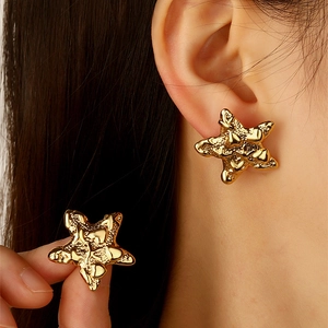 Vintage style gold starfish star earrings with irregular molten metal texture for women