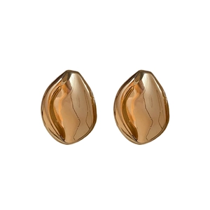 Elegant gold leaf-shaped irregular drop earrings with a polished pleated metal texture