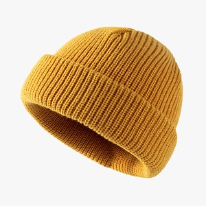 Classic yellow winter acrylic knit beanie with a folded cuff in a soft ribbed texture