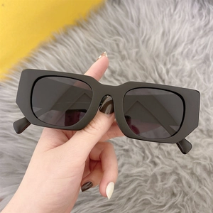 Retro rectangle sunglasses with thick black frames and dark lenses for men and women