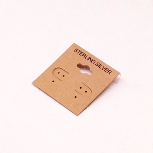 Detail of kraft PVC jewelry card with sterling silver print and hanging hole