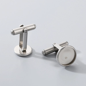 Detailed view of silver stainless steel round cufflink blanks for DIY jewelry projects