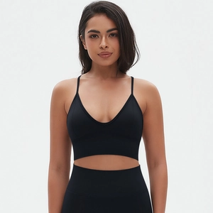 Detailed front view of seamless black V-neck sports bra and high-waisted leggings set