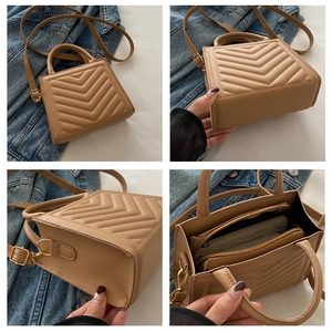 Detailed views of beige chevron quilted handbag with gold hardware and interior pockets