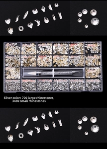 Detail of 21-grid nail art rhinestone kit with 700 shaped gems and 3480 round crystals