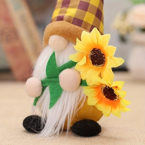 Close-up of a plush sunflower gnome featuring a yellow plaid hat and a long white beard