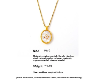 Detailed view of the oval mother of pearl pendant with zircon inlay on a gold chain