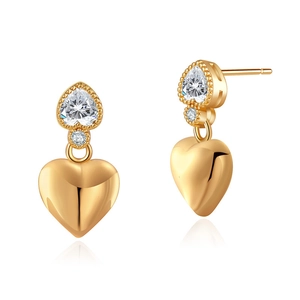 Elegant gold heart drop earrings featuring sparkling zircons and a polished metal finish