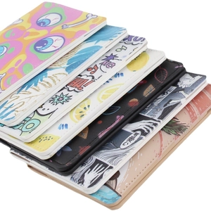 Patterned PU leather passport covers featuring various cartoon designs and colors