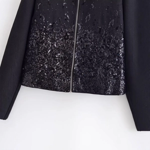 Fashionable black sequin jacket with silver metal zipper detail for a casual chic look