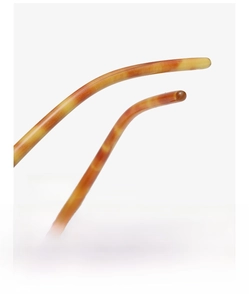 Macro detail of amber tortoiseshell eyewear temples with curved leg design for comfort