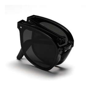 Portable folding sunglasses in gloss black finish with compact foldable frame design