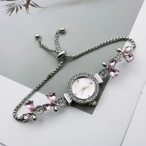 Montre à quartz argentée avec strass roses et bracelet réglable à chaîne coulissante