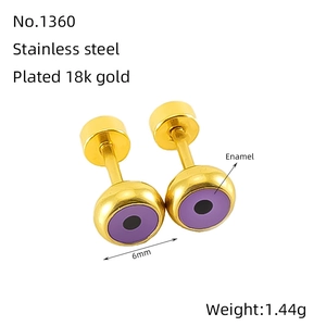 Macro view of 6mm 18K gold-plated steel stud with purple enamel evil eye detail