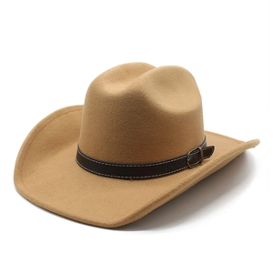 Macro detail of khaki western cowboy hat with brown leather band and vintage buckle