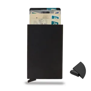 Minimalist black metal RFID blocking wallet with automatic pop-up card mechanism