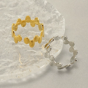 Adjustable geometric stainless steel ring in gold and silver finish with matte texture