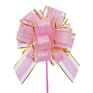 Detailed view of a pink and gold striped 3D pull bow flower for gift wrapping