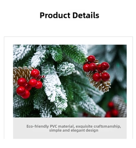 Macro shot of artificial pine branch with snow, pine cone and red berries detail