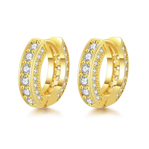 Detail shot of gold hoop earrings featuring three rows of micro-paved white cubic zirconia