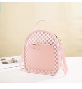 Detail of pink PU leather mini backpack with geometric pattern and front zipper pocket