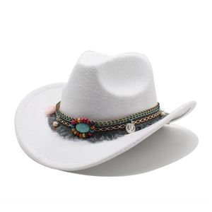 Detail of white wool cowboy hat with bohemian beaded band and turquoise stone accent