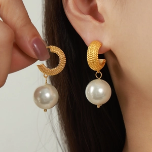 British style geometric C-shaped gold hoop earrings with large white pearl drop pendants
