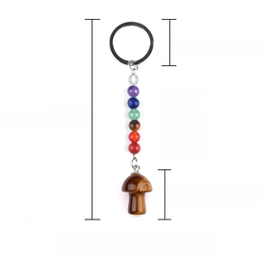 Chakra keychain with seven natural crystal beads and a tiger eye mushroom pendant charm
