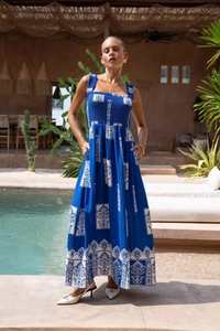 Detail of the blue and white printed long sundress with sleeveless smocked bodice design