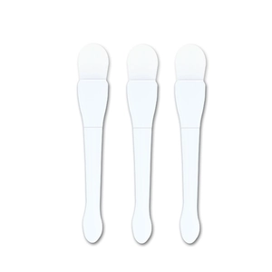 Set of three white dual-ended silicone face mask brushes with fishtail scoop handles