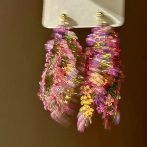 Floral crystal tassel earrings in purple and pink with gold metal stud hardware