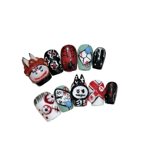 Handmade 3D gothic press-on nails with dark art patterns and unique monster charms