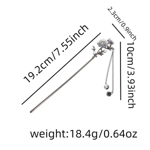 Detailed view of silver rose hair pin with tassel and measurements in cm and inches