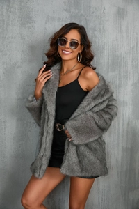 Detail of grey faux fur coat texture with fluffy fibers and stylish high-end finish
