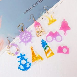 DIY ocean theme resin jewelry set with anchor, lighthouse and palm tree charms